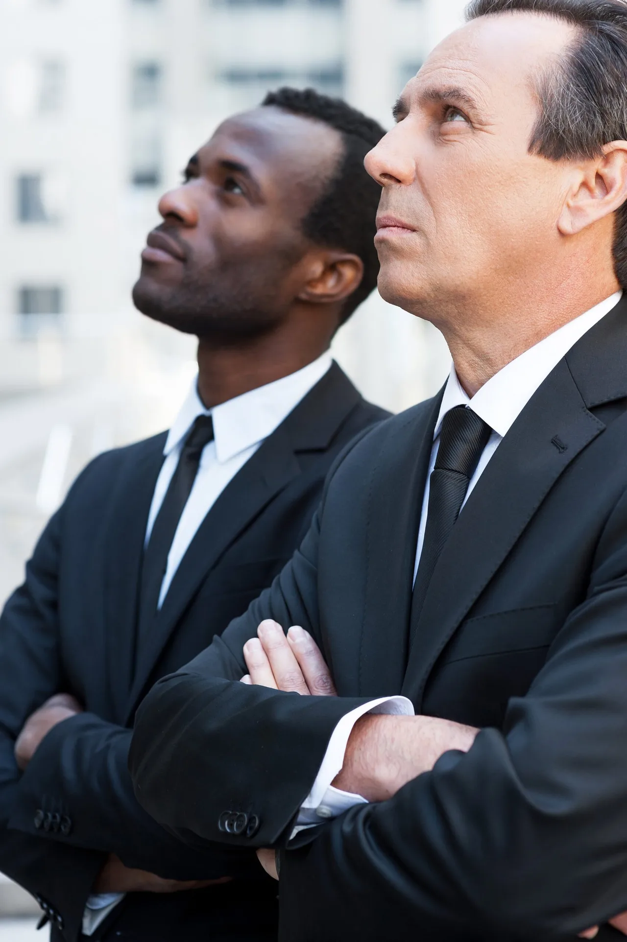 Two security professionals in consultation.